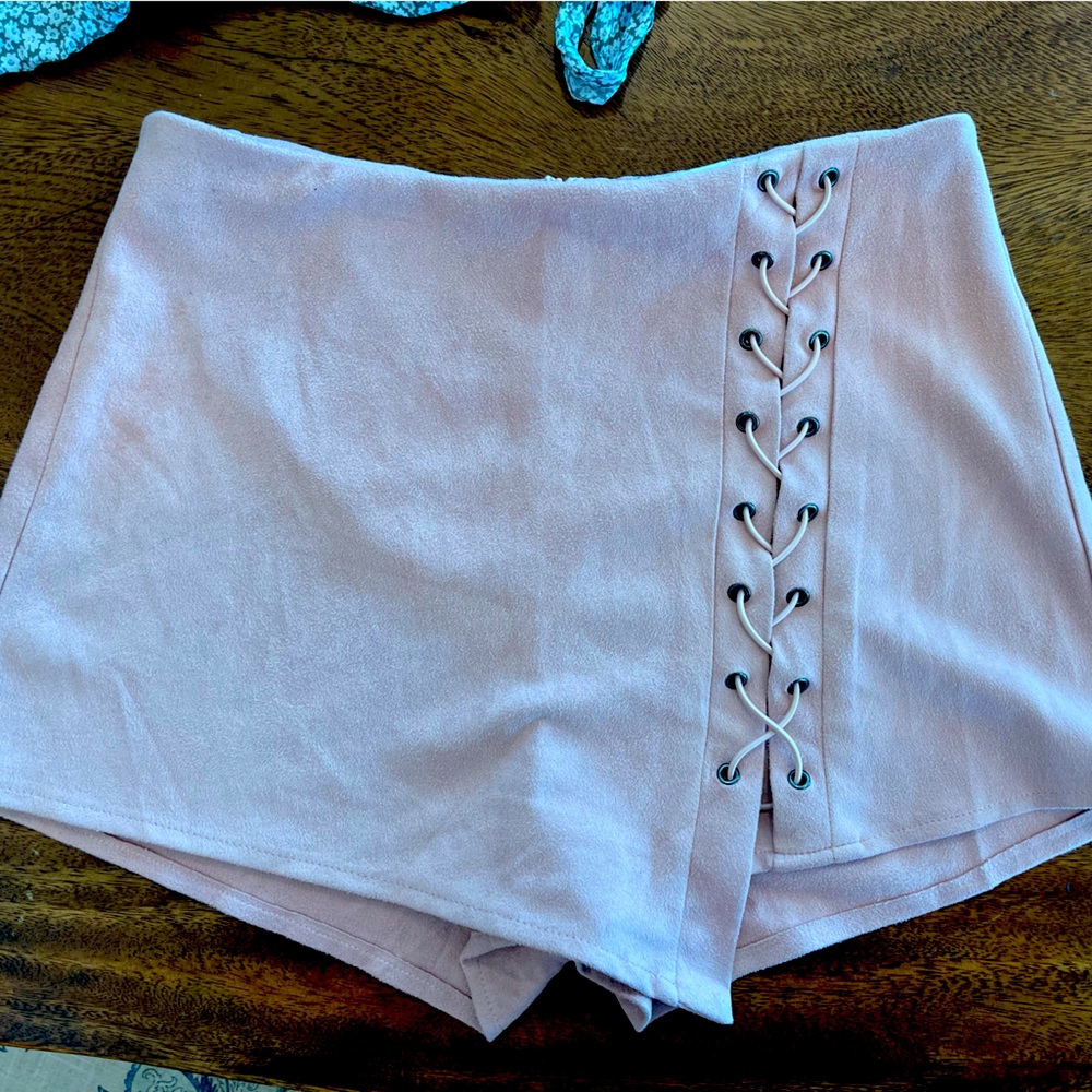 Showpo size 10 skort. I’m a size six and it fits great. High waisted